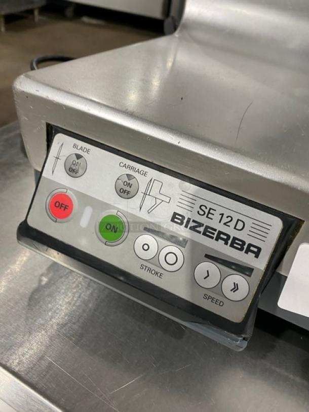 Bizerba SE12D commercial deli meat slicer, electric, countertop, on legs, visible control panel, 120V.