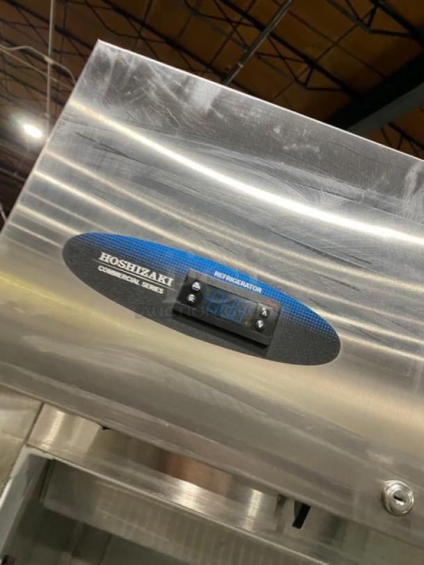 Hoshizaki CR1SFGECR stainless steel glass door merchandiser refrigerator, Energy Star, poly coated wired rack, on casters.