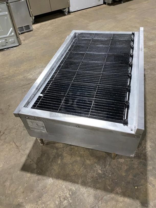 Vulcan VCCB471 stainless steel gas countertop char broiler with cast iron grates, on legs. Model: VCCB471, SN: 658010586.