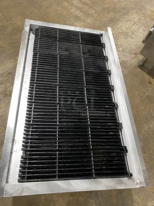 Vulcan VCCB471 stainless steel natural gas charbroiler with cast iron grates, on legs, excellent condition.