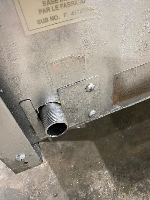 Vulcan VCCB47-1 stainless steel natural gas char broiler, cast iron grates, model tag visible, on legs, side view.