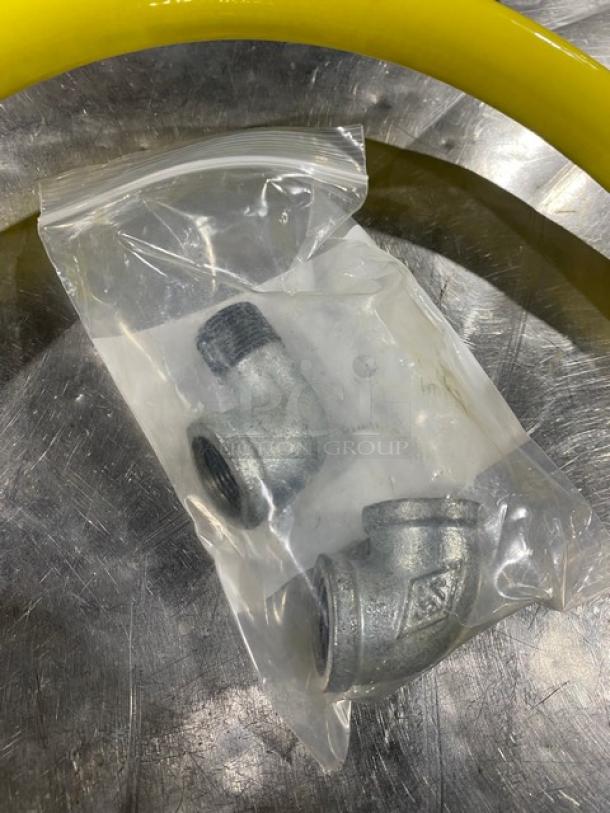 BRAND NEW! T&S Brass Safe-T-Link Series 48” gas appliance connector hose, Model HG-6D-48, with fittings in sealed bag.