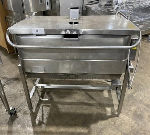 Groen stainless steel 40-gal. tilt skillet, model NHFPE4, natural gas, with single spout faucet, on legs.