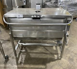 Groen stainless steel 40-gal. tilt skillet, model NHFPE4, natural gas, with single spout faucet, on legs.
