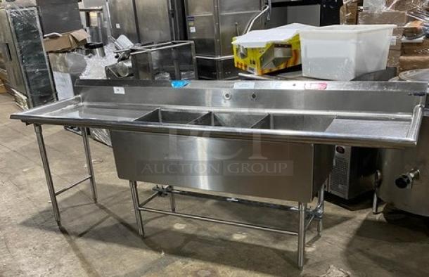 Wasserstrom stainless steel 3-compartment sink with left and right drain boards, on legs, in good condition. Ideal for commercial use.