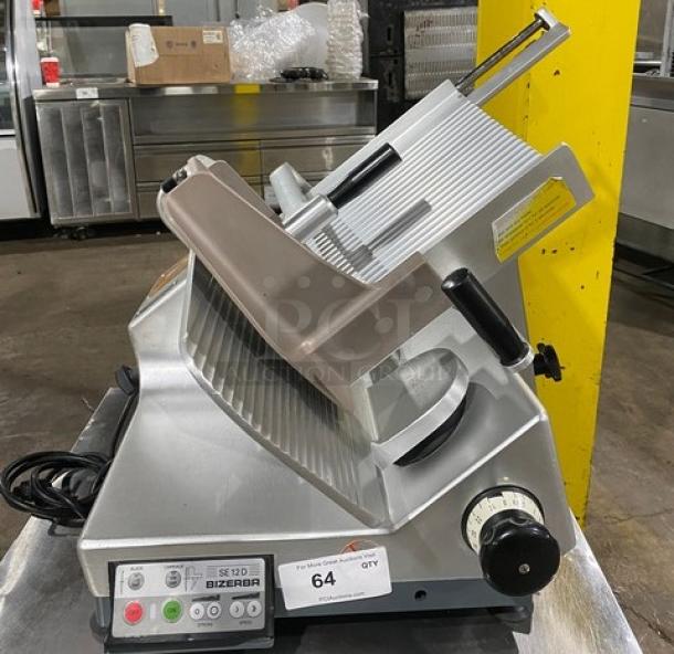 Bizerba SE12D commercial electric deli meat slicer, 120V, countertop model on legs, silver, with control panel and safety labels.