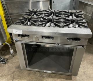U.S. Range stainless steel 6-burner natural gas range with a cabinet-style base on casters. Excellent condition.
