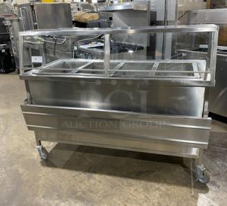 Atlas Metal WIHD&M4 stainless steel 4-well hot food steam table with sneeze guard, electric, 208V, on casters, excellent condition.