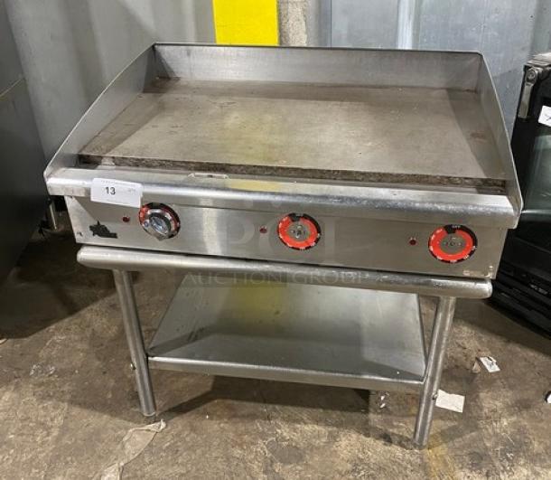 Star Max Series 36" stainless steel electric griddle with back and side splash, single undershelf stand, and legs.