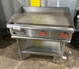 Star Max Series 36" stainless steel electric griddle with back and side splash, single undershelf stand, and legs.