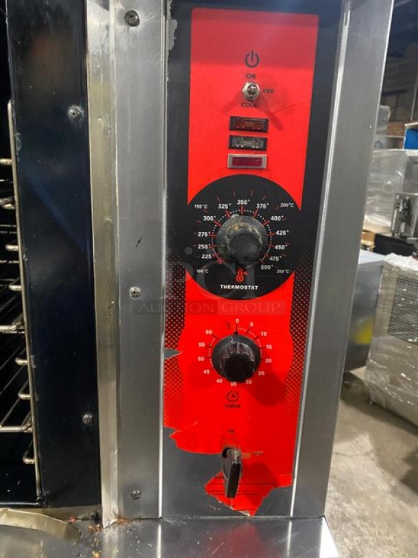 Vulcan commercial stainless steel gas convection oven, double stacked, wired rack, visible temperature control dial, on legs.