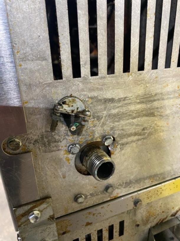 Vulcan commercial stainless steel gas convection oven, double stacked, with wired rack. Moderate wear, on legs.