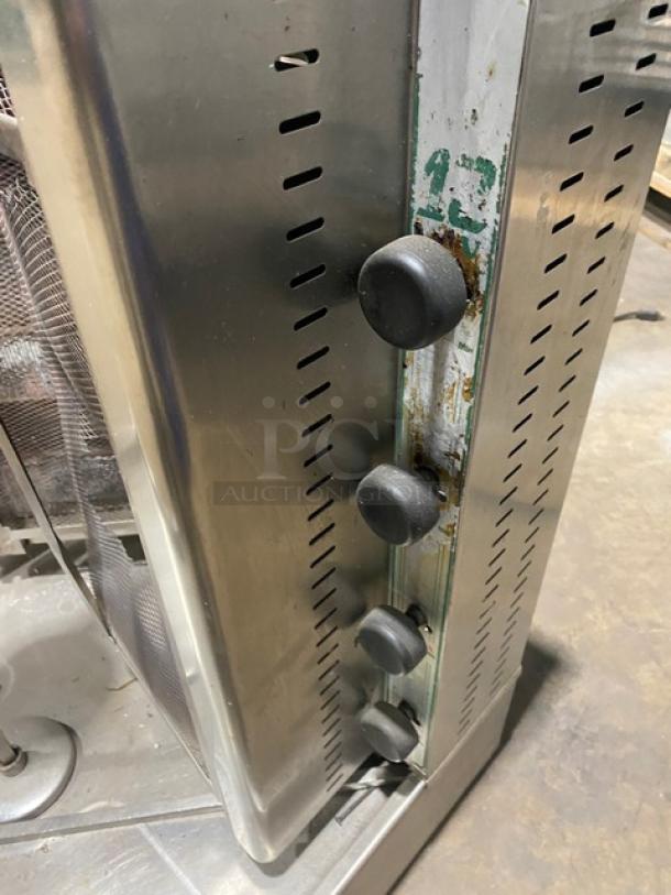 Visvardis DG12V stainless steel turbo gyro machine with 6 double burners. Propane/natural gas powered. On legs. Model SN: 0377.