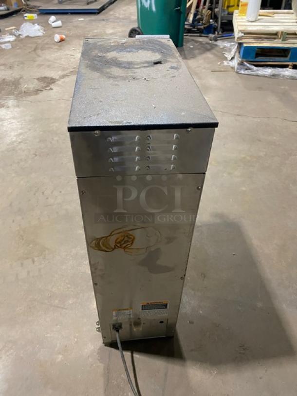 Bunn Infusion Series ITCB-DV coffee brewer with worn stainless steel exterior and visible rust. Model ITCB-DV SN: ITCB091483.