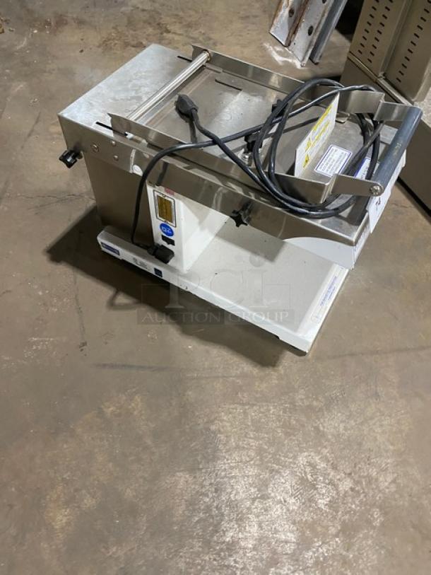 Oliver Model 738 slicer, white powder-coated stainless steel, countertop design, electric powered, 115V 1 phase; working condition.
