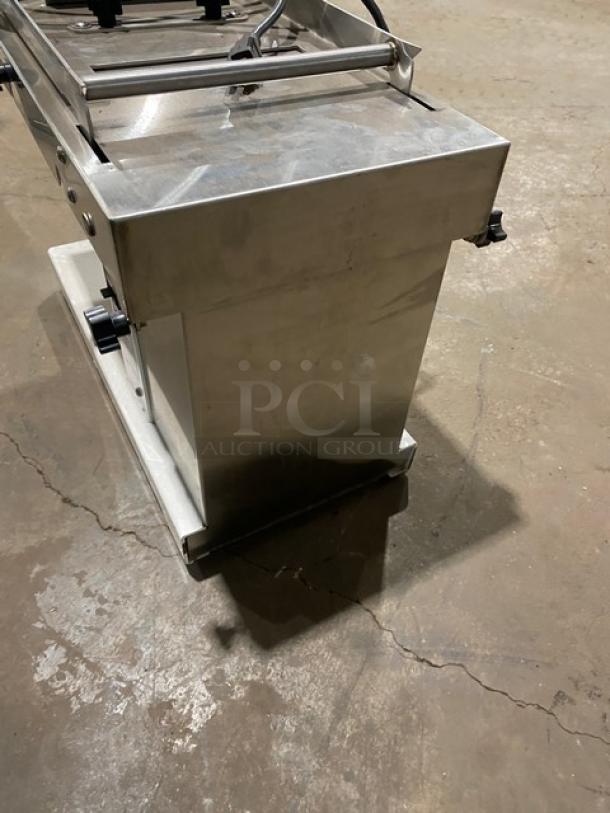 Oliver Model 738 white powder-coated stainless steel electric mini chip/bagel slicer. Countertop, gravity-feed. 115V, used.