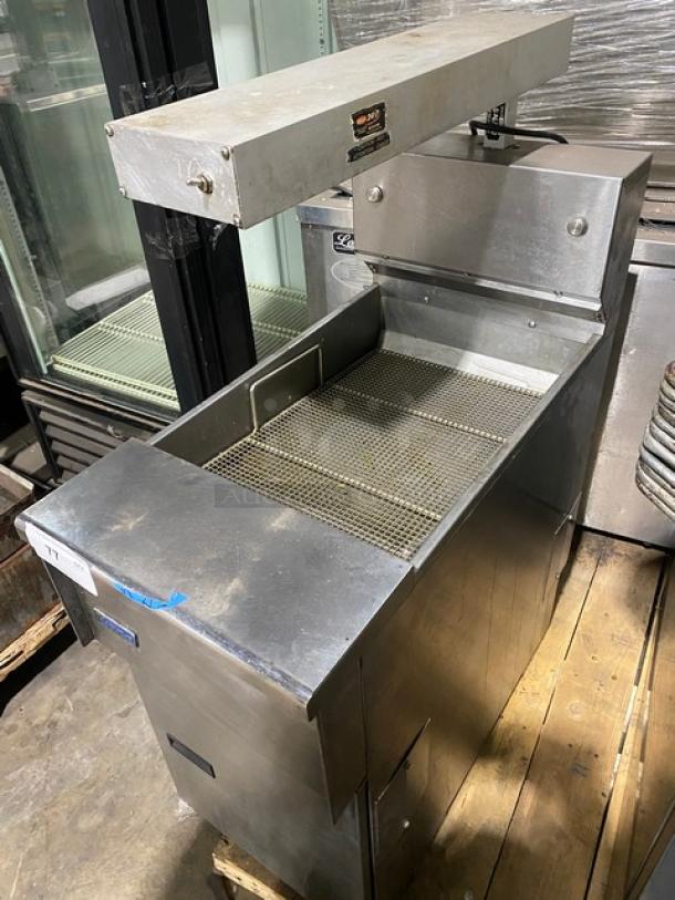 Pitco Solstice SELVBNB commercial fryer, stainless steel, with BNB dump station and overhead heat lamp, on legs; SN: F19FD039673.