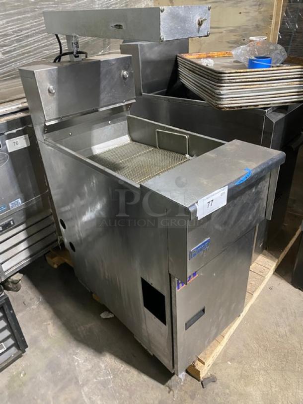 Pitco Solstice Series stainless steel SELV fryer, model SELVBNB, with BNB dump station and heat lamp, on legs. Serial: F19FD039673.