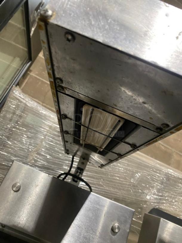 Pitco Solstice Series SELVBNB stainless steel fryer with bread & batter cabinet, BNB dump station, and overhead heat lamp.