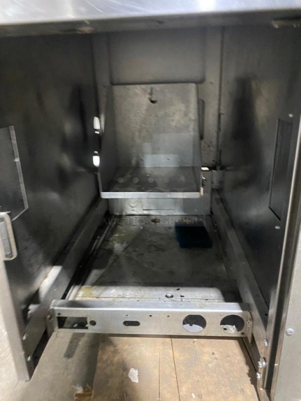 Pitco Solstice SELVBNB stainless steel fryer cabinet with BNB dump station, overhead heat lamp, and legs. Model: SELVBNB.