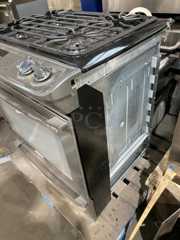 Frigidaire Professional stainless steel gas range/oven combo, model FPGS3085KFH, with 4 burners, warming drawer, wired oven rack.