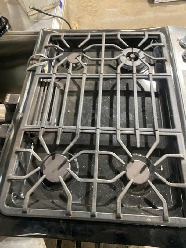 Frigidaire Professional series stainless steel gas-powered range/oven, model FPGS3085KFH, features 4 burners and wired oven rack.