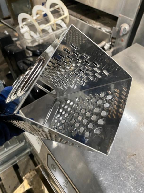 Commercial stainless steel 4-sided handheld box grater, featuring multiple grating surfaces. Excellent condition.