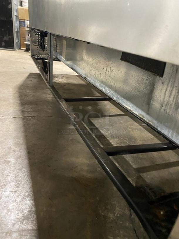 True Commercial Stainless Steel 3-Door 72" Worktop Refrigerator, model TWT-72, Energy Star, on casters, upturned backsplash.