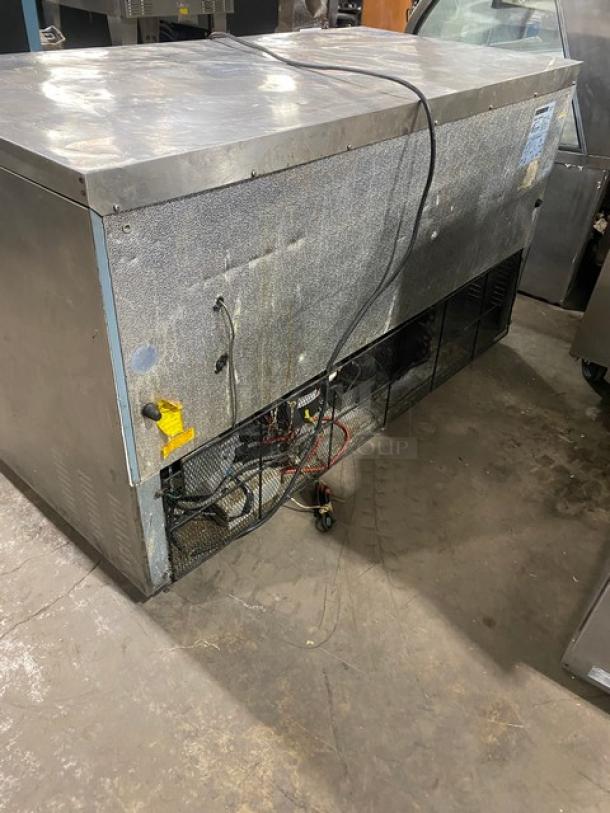 Maxx Cold X-Series 60" stainless steel 2-door worktop freezer, Model MXCF60U, includes poly-coated wired rack, 115V 1 phase.