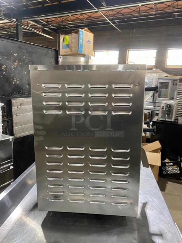 Cooler Depot commercial stainless steel batch freezer, model BQL-112Y, electric, countertop, on legs, in industrial setting.