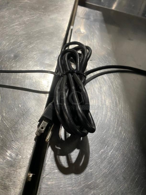 Hobart HTi7LH4 electric price computing scale/printer with stainless steel worktop. Operator and customer displays. Model: HTi-7LH4.