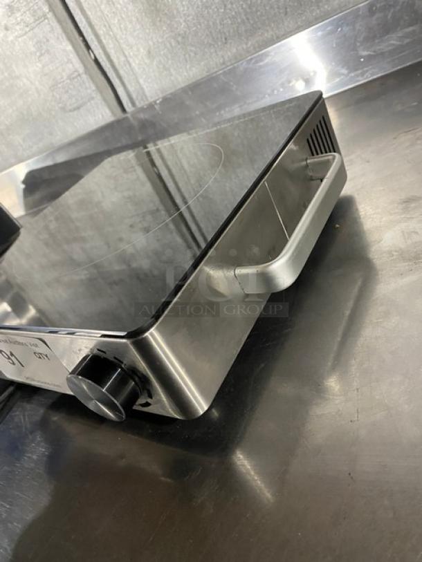 Amko AK-IR15 stainless steel ceramic infrared cooktop. Single-burner, electric, portable. Features control knob and side handle.