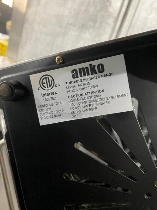 Amko AKIR15 stainless steel ceramic infrared cooktop, single-burner, 120V, ETL certified, prominent label with caution info.
