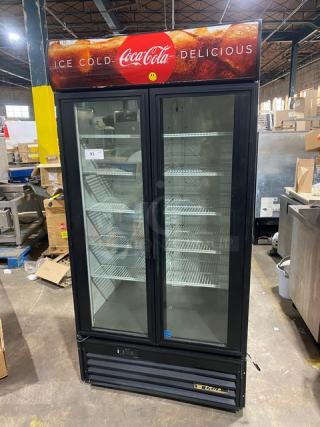 True Coca-Cola Style Commercial Black Double Glass Swing Door Reach-In Merchandiser Refrigerator! Energy Star Certified! With Poly Coated Wired Rack! Model: GDM-35EM SN: 7182176! 115V 1 Phase! - Item #1226554