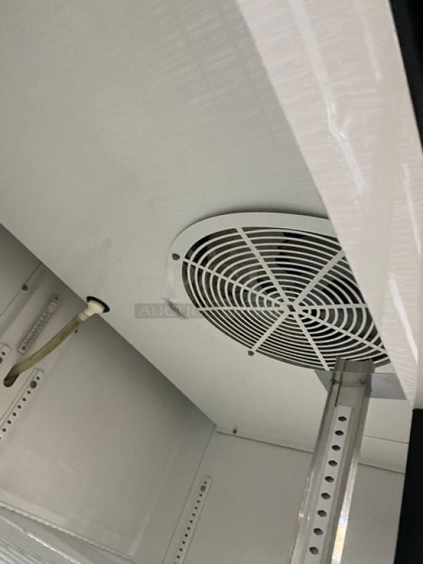 True Coca-Cola style black double glass door refrigerator, Model GDM-35EM, Energy Star Certified, with poly coated wire rack.