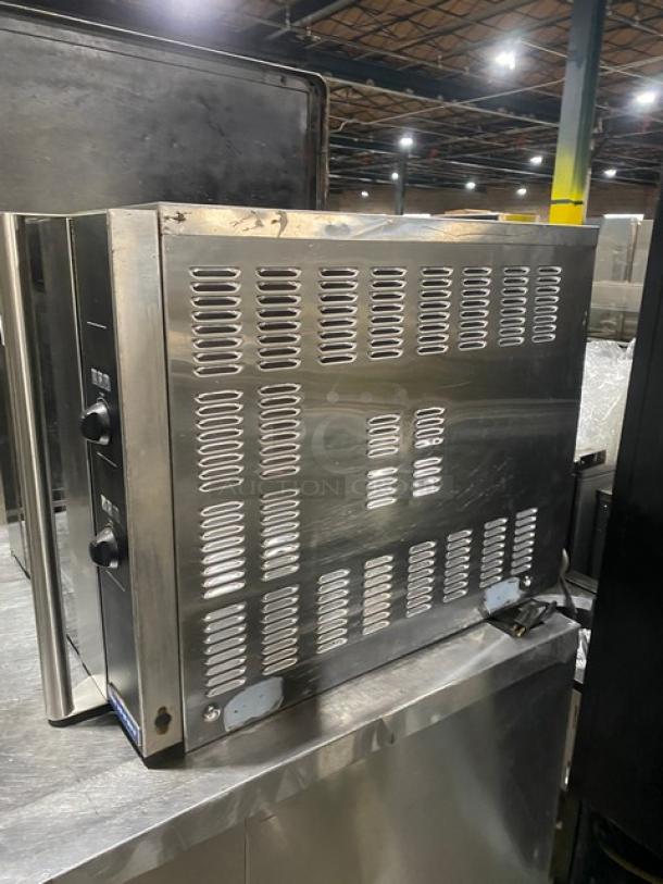 Moffat Turbofan Series stainless steel countertop convection oven with wired rack; electric powered, used condition.