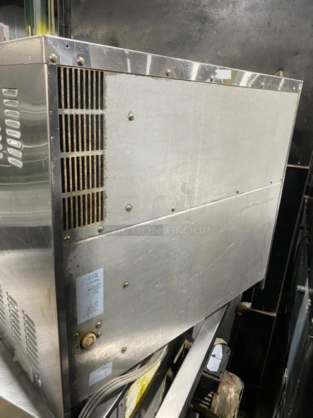 Moffat Turbofan stainless steel electric convection oven, countertop model, includes wired oven rack, visible wear.