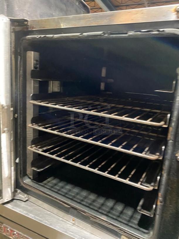 Moffat Turbofan Series commercial stainless steel countertop convection oven with wired racks, electric powered, used condition.