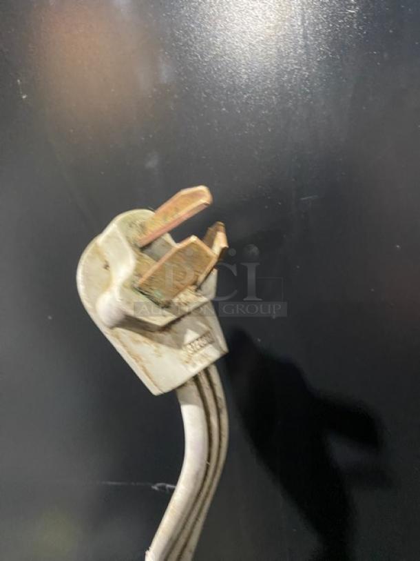 Alt text: Moffat Turbofan Series electric convection oven power plug, showing wear.