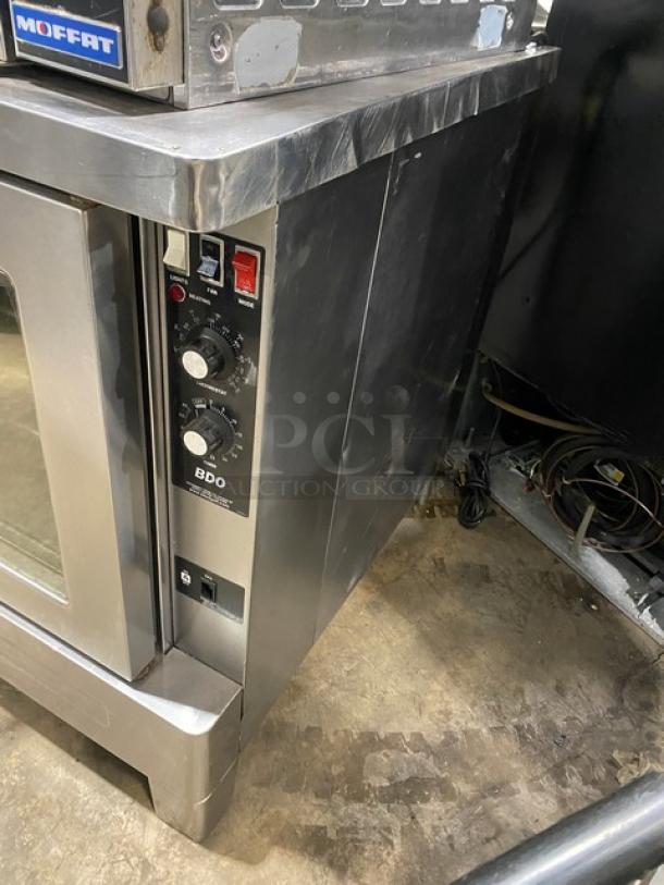 Blodgett BDO Series stainless steel gas convection oven, Energy Star certified, single stack, with wired oven rack, on legs.