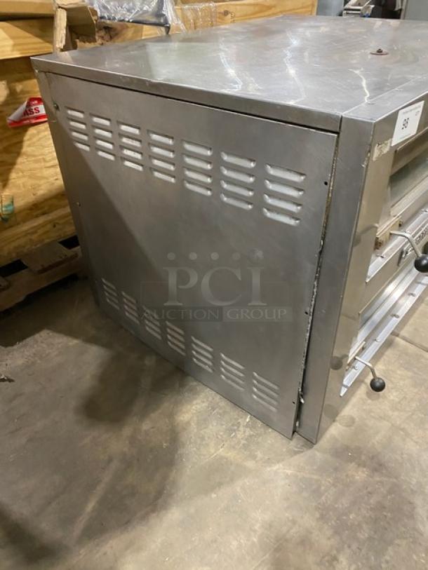 Bakers Pride SuperDeck EP-2-2828 double deck stainless steel pizza oven. Electric-powered, 208V, 3 phase. Good condition.