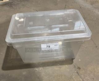 Cambro clear polycarbonate rectangular food storage container with lid. Durable, transparent design; label showing item 79 visible.