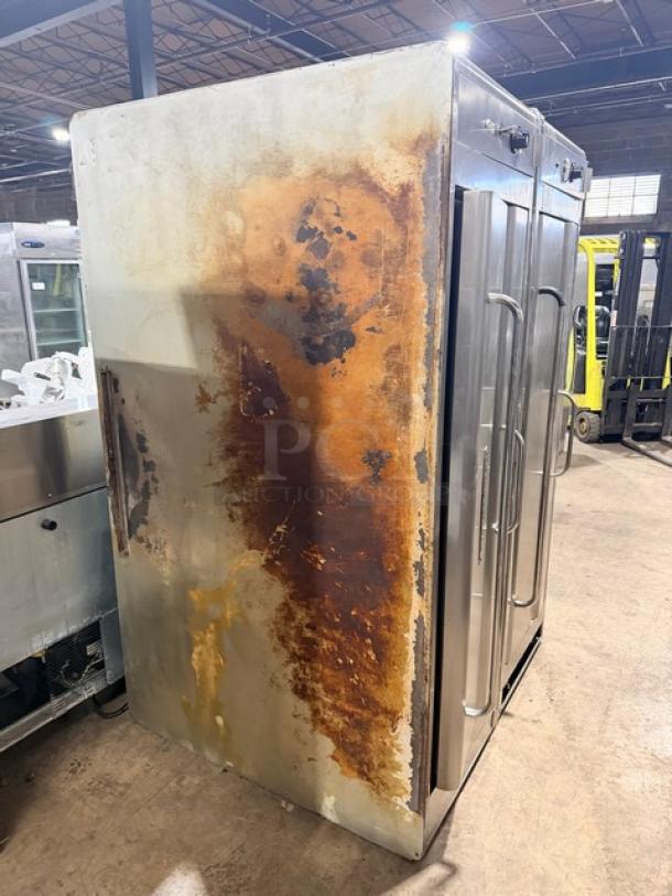 Blodgett 1060 stainless steel pizza deck oven, double stacked, natural gas, on legs, visible rust on side.