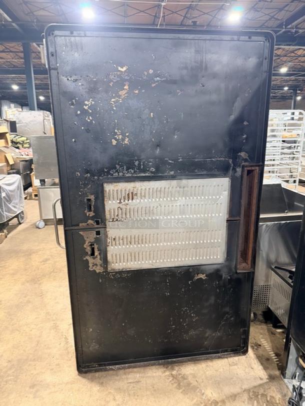 Blodgett 1060 commercial pizza deck oven, natural gas, double-stacked, stainless steel, on legs, weathered condition.