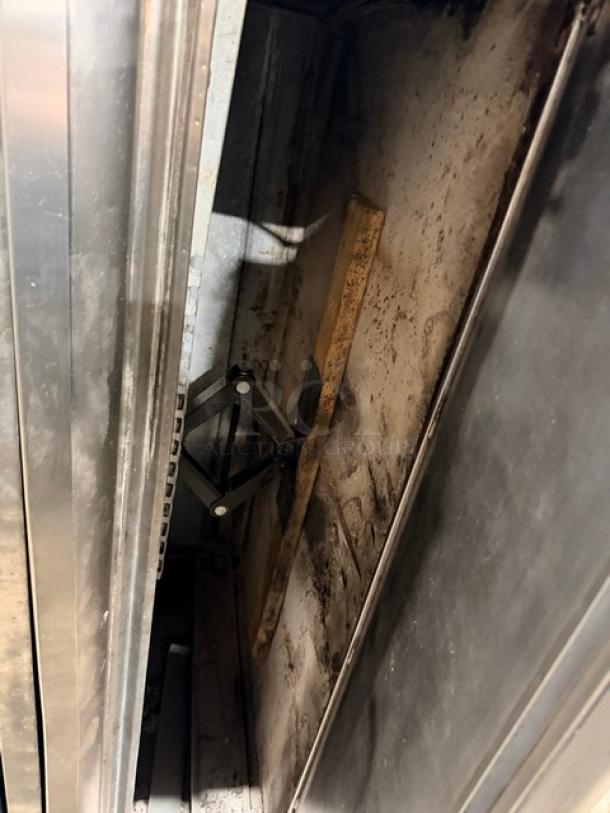 Blodgett 1060 pizza deck oven interior, stainless steel, natural gas, double-stacked, used condition, model 1060.