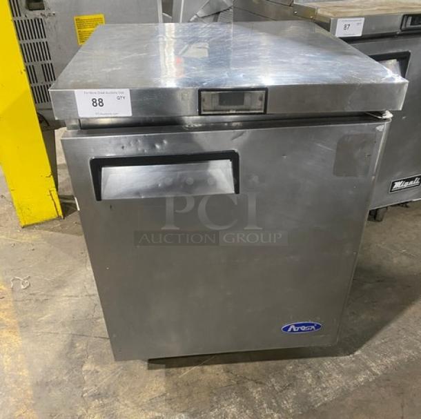 Atosa stainless steel single door undercounter worktop freezer with poly coated wired rack, 115V, on casters.