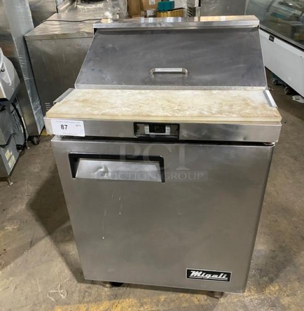 Migali stainless steel refrigerated bain marie prep table with cutting board, poly-coated rack, on casters, used condition.