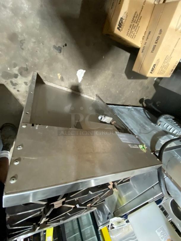 Jade Range Bistro Series stainless steel 4-burner gas range/oven combo with wired rack on legs, commercial-grade.