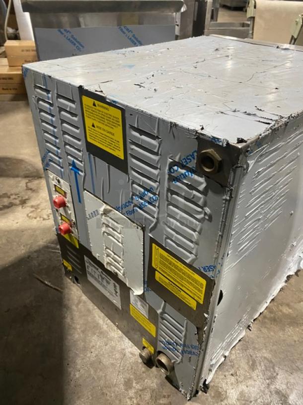 Cleveland Range SteamChef Series 22CET6 stainless steel 6-pan steamer, scratch-n-dent, Energy Star, tags with model info visible.