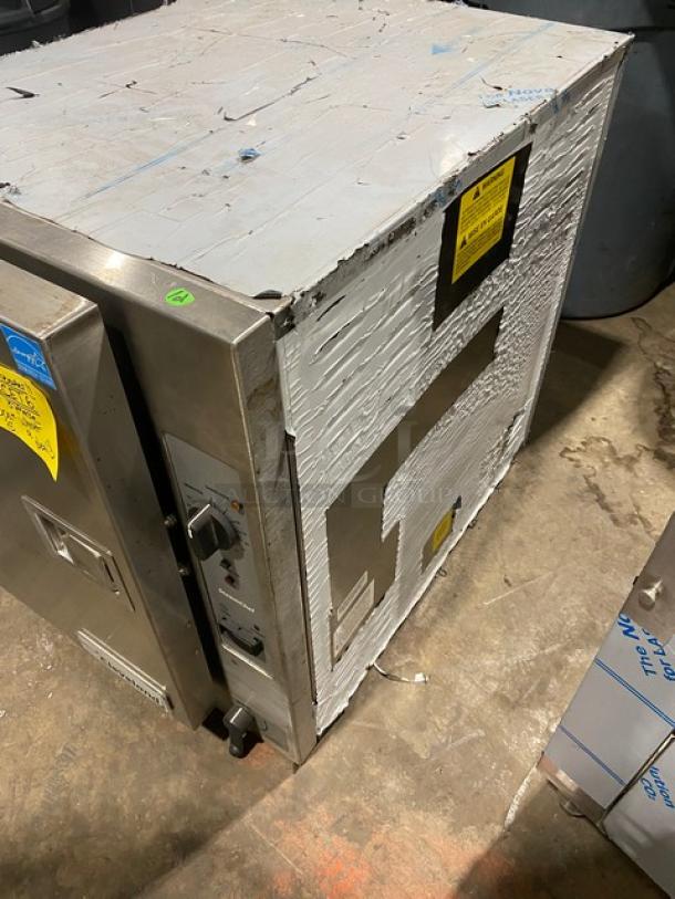 Cleveland Range SteamChef 22CET6 commercial stainless steel convection steamer. Scratch-n-dent condition, 6-pan capacity, Energy Star certified, built-in pan holding rack visible. Serial number: 160423052970, 208V 3 Phase.